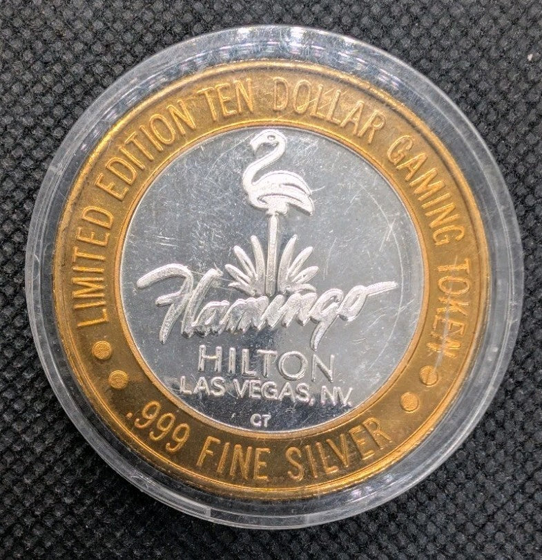 Las Vegas Gaming Token Flamingo Hilton - Center 0.6oz .999 Silver - Brass Ring0