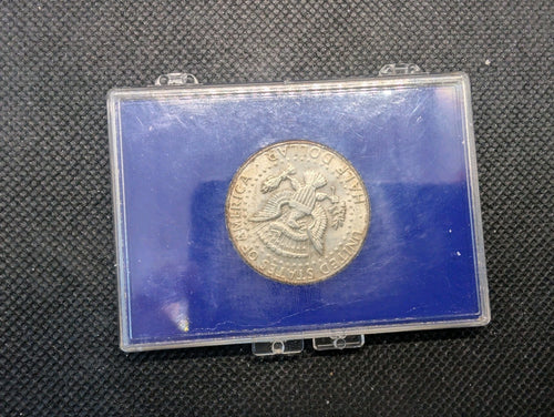 1964   American Memorial Half Dollar.   John F, Kennedy.    90% silver1