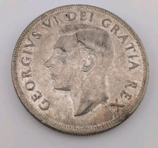 1951 Canada Silver Dollar – George VI “Voyageur” Design | Nice Collector Grade1