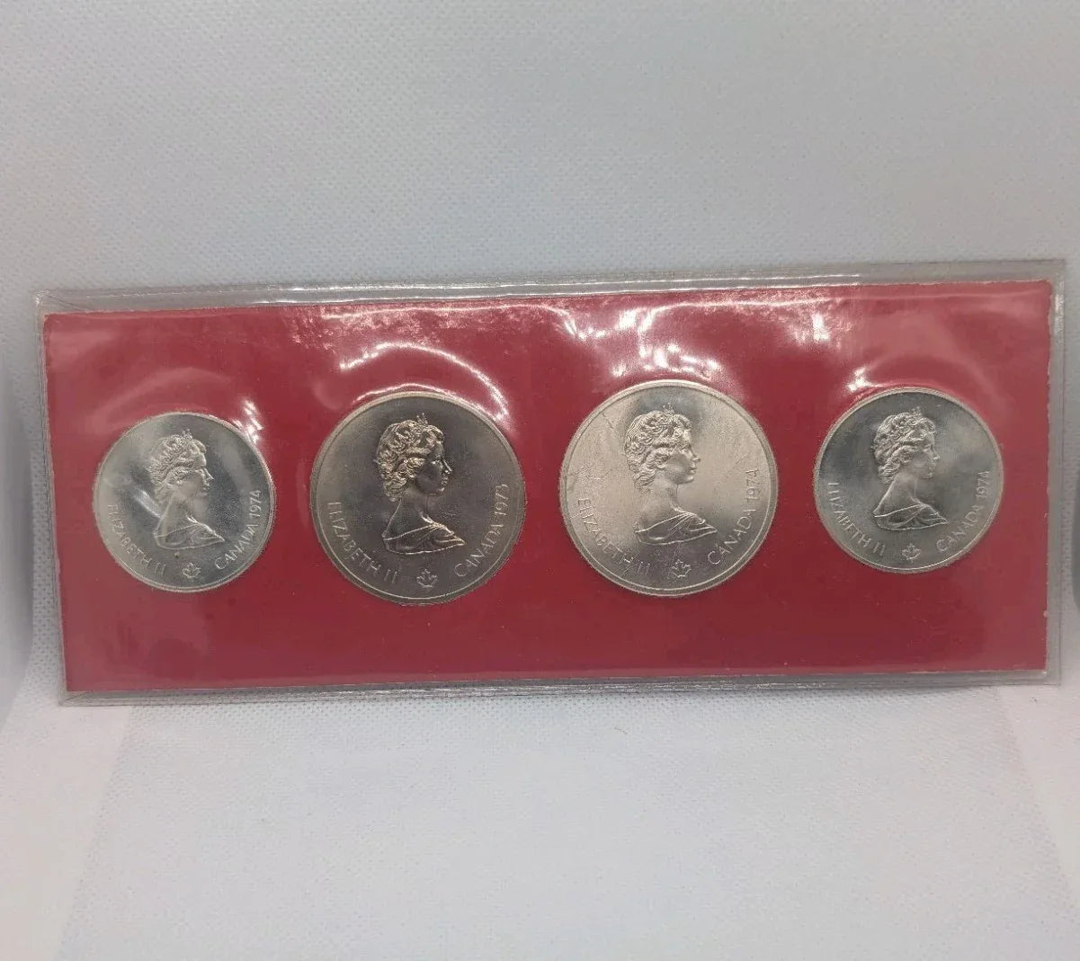 Montreal Olympic 1976 Sterling Silver Coins Issued 1974, Set of 4 Uncirculated - NumisFind
