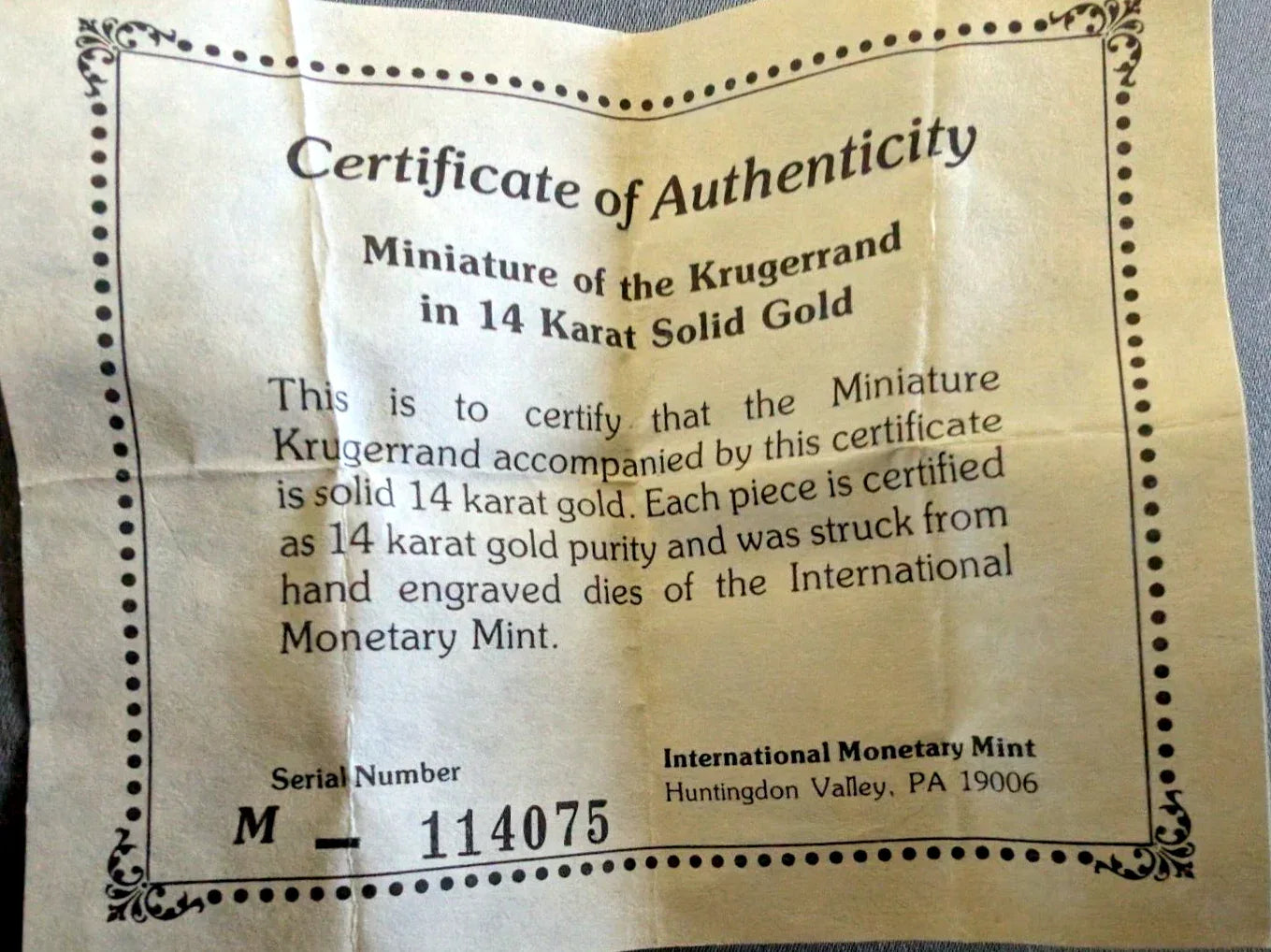 14K Gold Miniature Krugerrand with COA International Monetary Mint - NumisFind