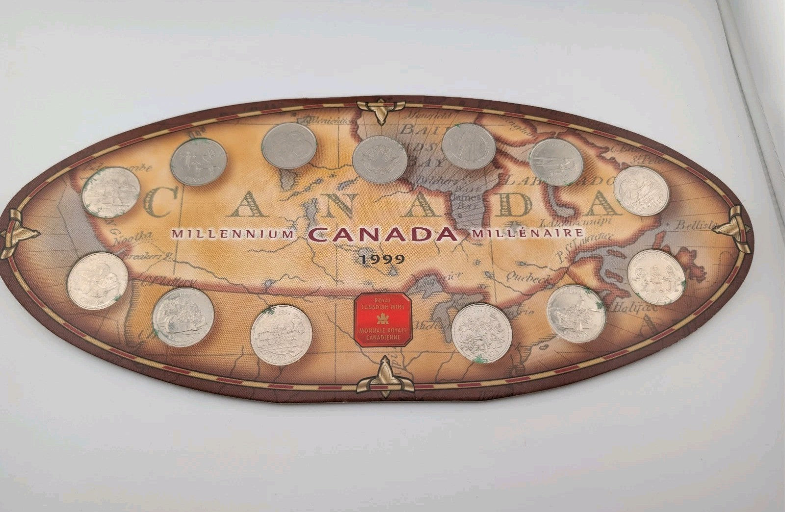 1999 Canada Millennium 12x Quarter (25c) Oval Coin Set.0