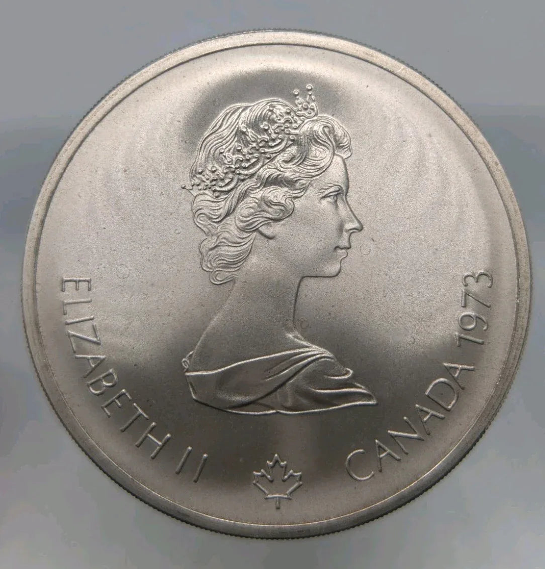 1973 Montreal Olympic Silver Coin In epoxy cube - The city - Desk weight - NumisFind