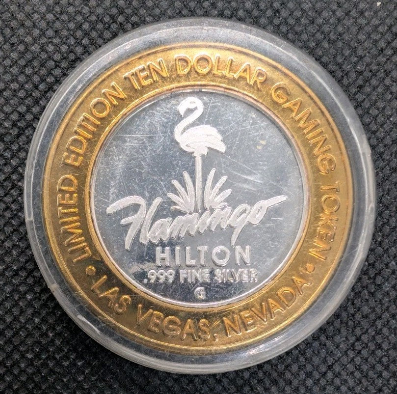 Las Vegas Gaming Token Flamingo Hilton - Center 0.6oz .999 Silver - Brass Ring1