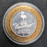 Las Vegas Gaming Token Flamingo Hilton - Center 0.6oz .999 Silver - Brass Ring1