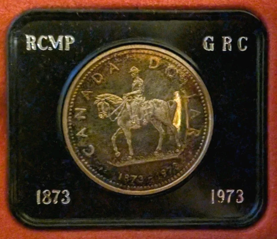 Two 1973 Cdn Silver Dollars - 1 Lightly Toned & 1 UNC - 100 years of RCMP - NumisFind