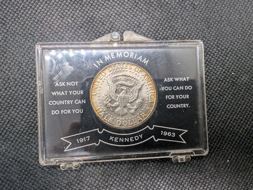 1964   American Memorial Half Dollar.   John F, Kennedy.    90% silver0