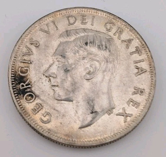 1952 Canada Silver Dollar – George VI “Voyageur” Design | Nice Collector Grade1