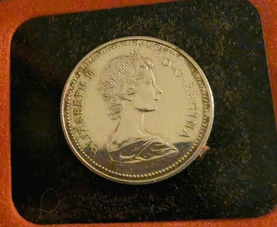 Two 1973 Cdn Silver Dollars - 1 Lightly Toned & 1 UNC - 100 years of RCMP - NumisFind