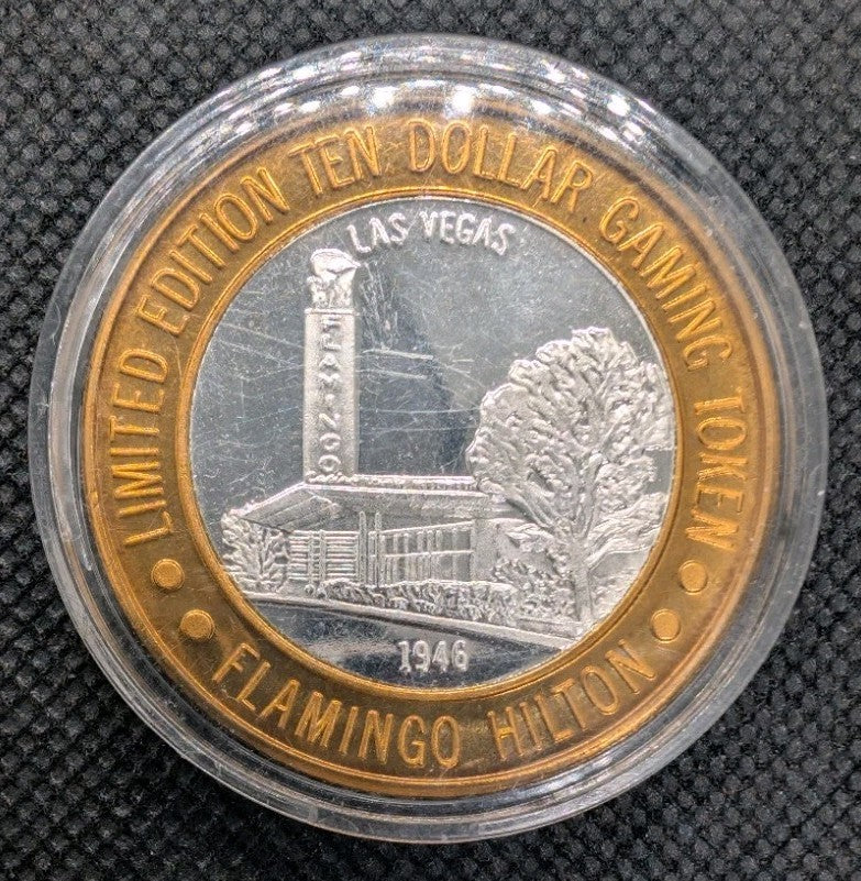 Las Vegas Gaming Token Flamingo Hilton - Center 0.6oz .999 Silver - Brass Ring1