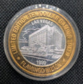 Las Vegas Gaming Token Flamingo Hilton - Center 0.6oz .999 Silver - Brass Ring0