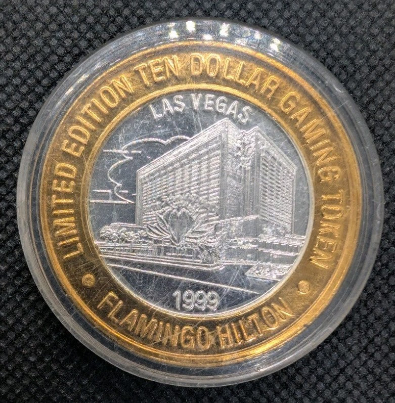 Las Vegas Gaming Token Flamingo Hilton - Center 0.6oz .999 Silver - Brass Ring0