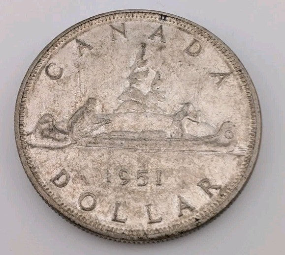 1951 Canada Silver Dollar – George VI “Voyageur” Design | Nice Collector Grade0