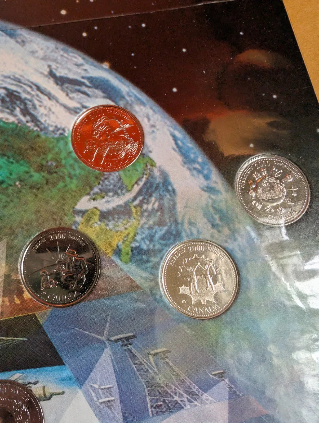 Canada 2000 Millennium Designs BU 12 Coin Quarter Set in Cardboard!! - NumisFind